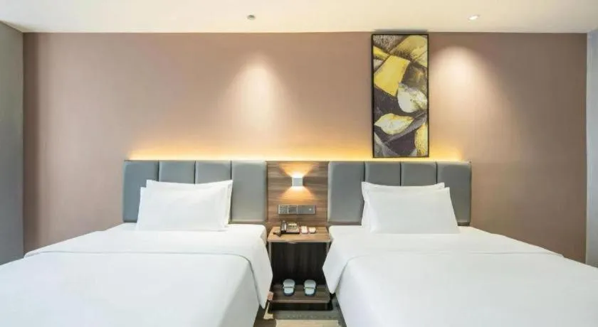 Bed in 7 Days Inn Yingshang Lanxing Building Materials Market