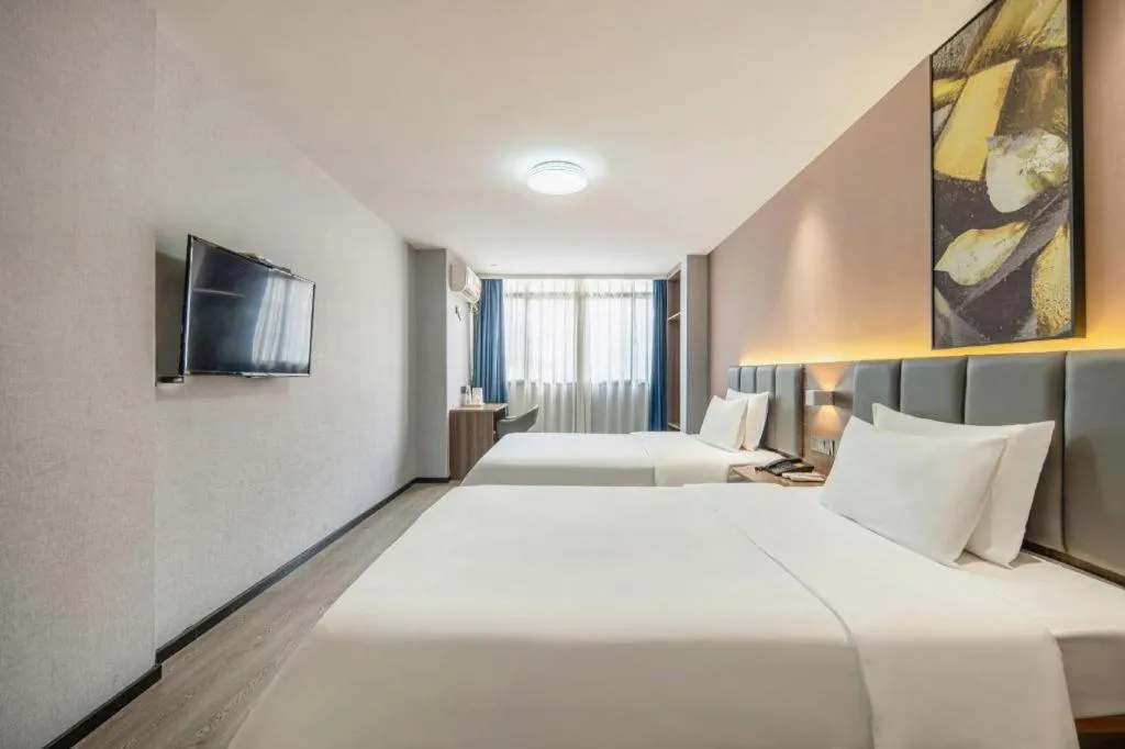 Bed in 7 Days Inn Yingshang Lanxing Building Materials Market