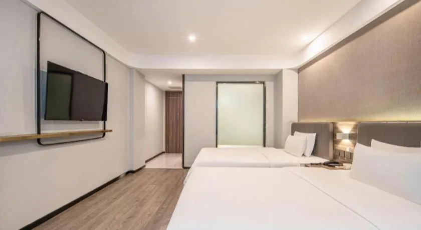 Bed in 7 Days Inn Yingshang Lanxing Building Materials Market