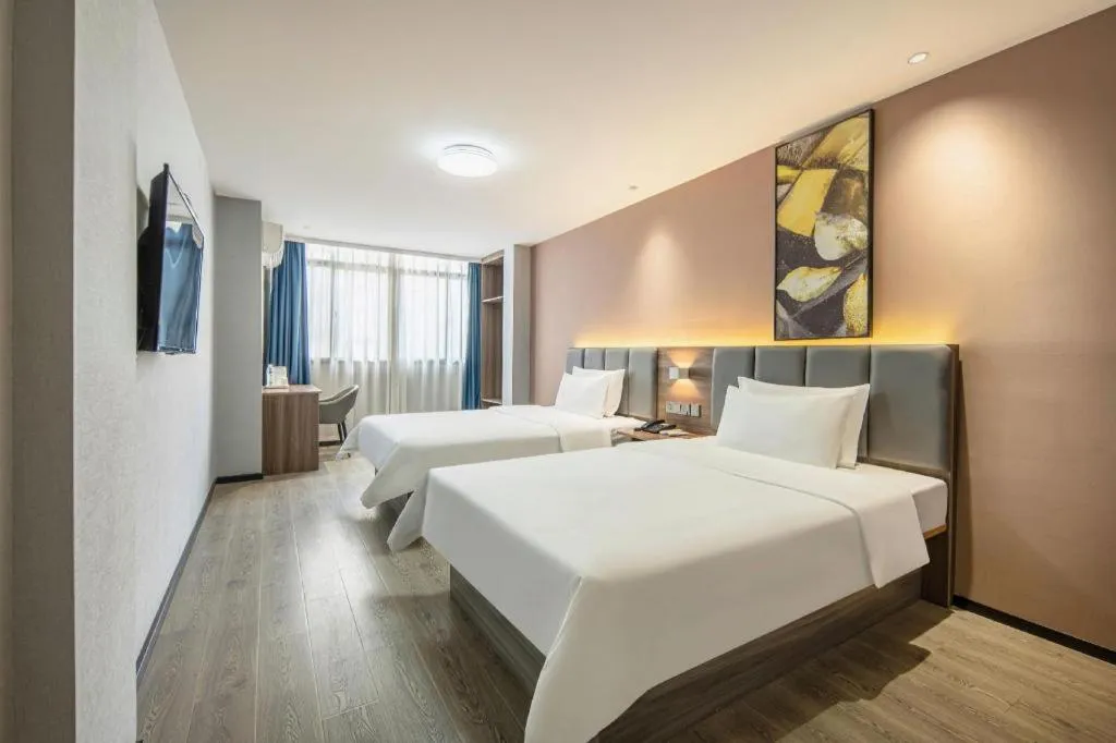 Bed in 7 Days Inn Yingshang Lanxing Building Materials Market