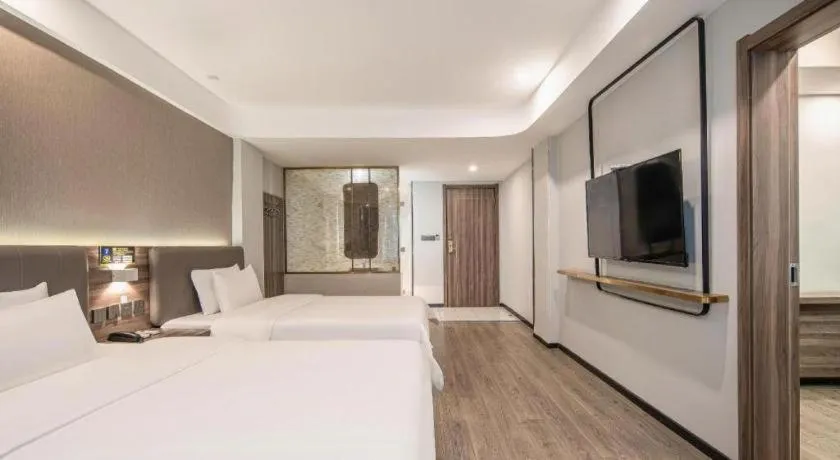 Bed in 7 Days Inn Yingshang Lanxing Building Materials Market