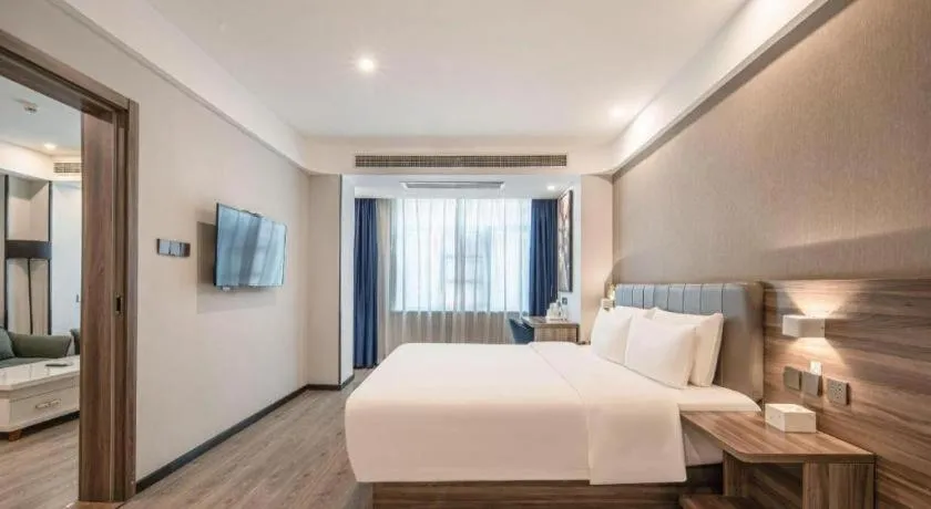 Bed in 7 Days Inn Yingshang Lanxing Building Materials Market