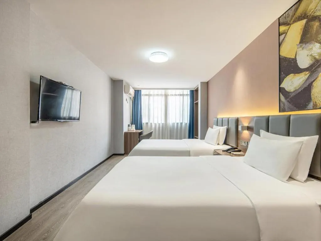 Bed in 7 Days Inn Yingshang Lanxing Building Materials Market