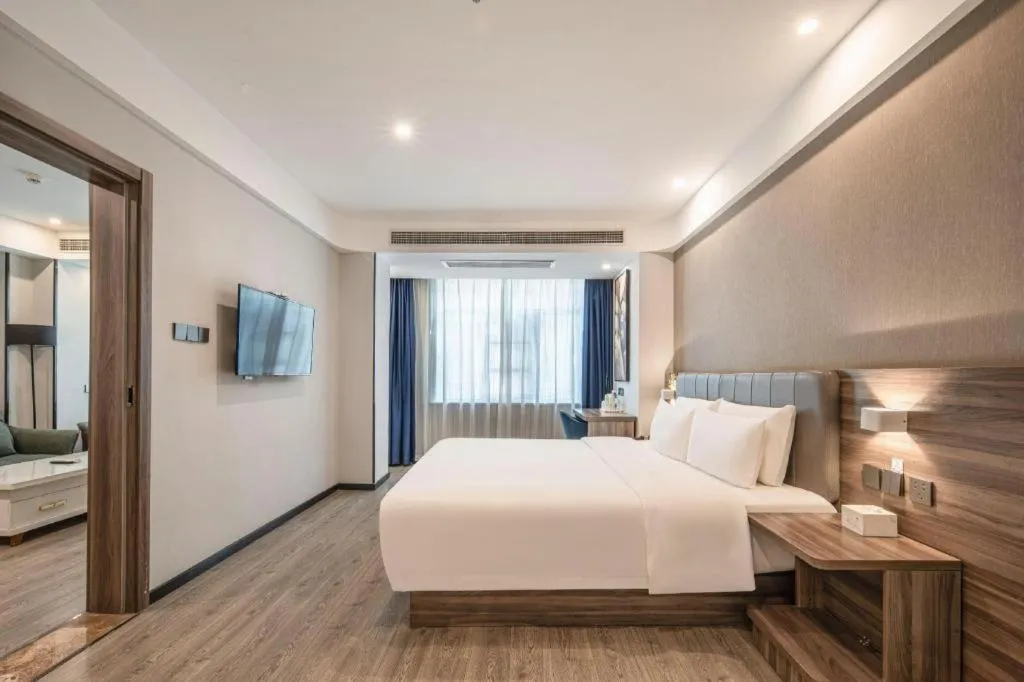 Bed in 7 Days Inn Yingshang Lanxing Building Materials Market
