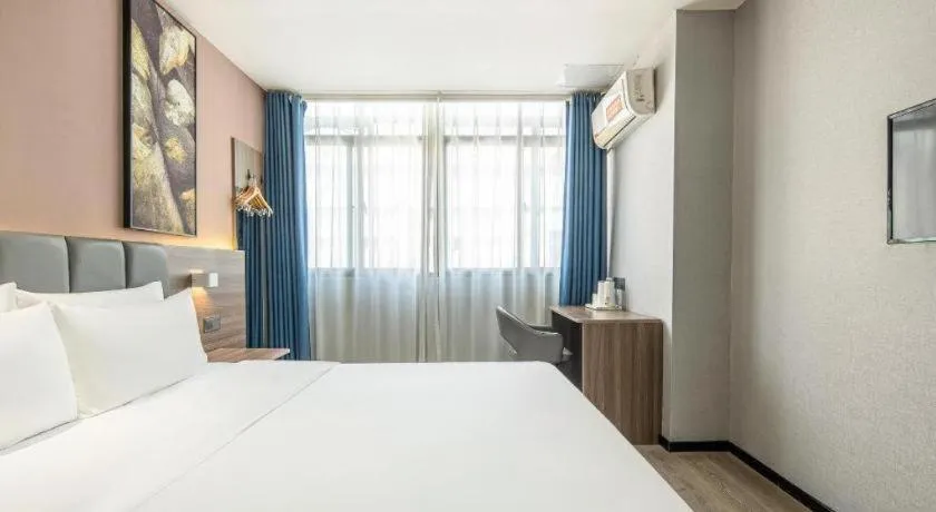 Bed in 7 Days Inn Yingshang Lanxing Building Materials Market