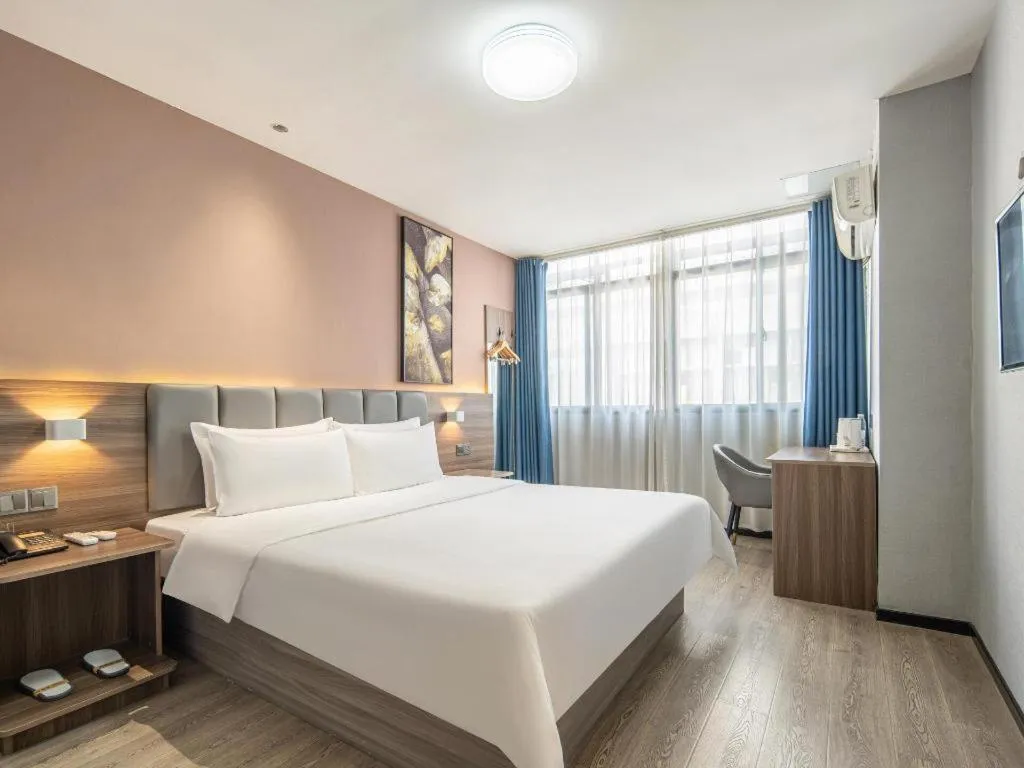 Bed in 7 Days Inn Yingshang Lanxing Building Materials Market