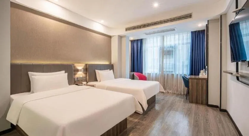 Bed in 7 Days Inn Yingshang Lanxing Building Materials Market