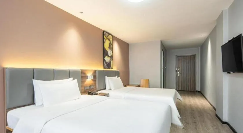 Bed in 7 Days Inn Yingshang Lanxing Building Materials Market