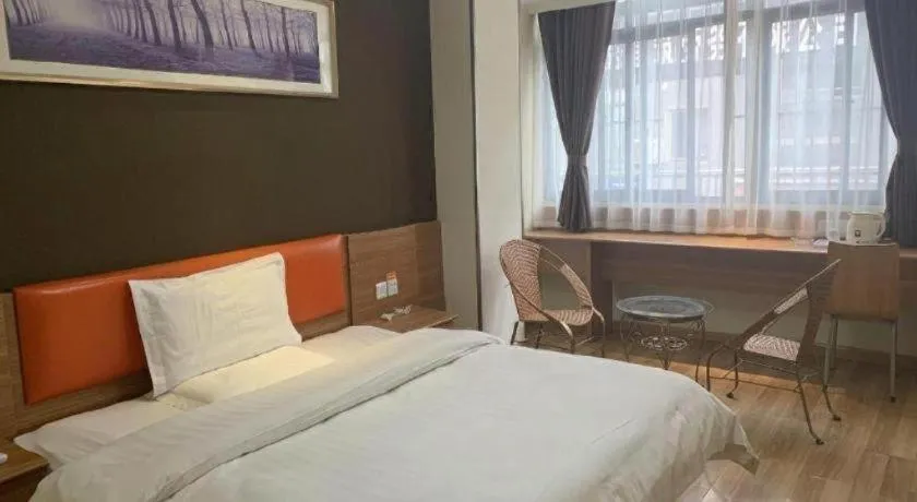 Bed in 7 Days Inn Yingshang Lanxing Building Materials Market