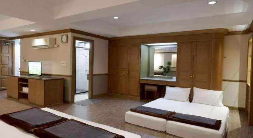 Bed in Alameda Suites Hotel