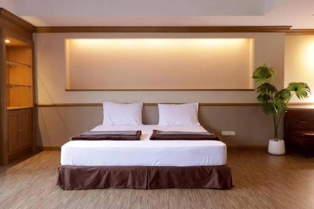 Bed in Alameda Suites Hotel