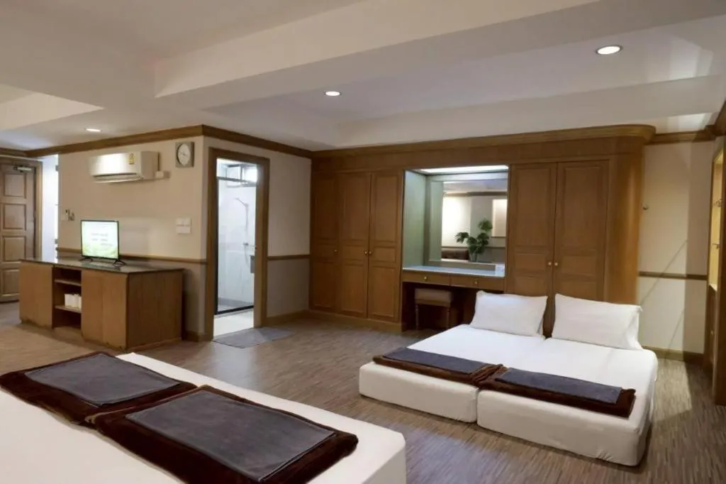 Bed in Alameda Suites Hotel