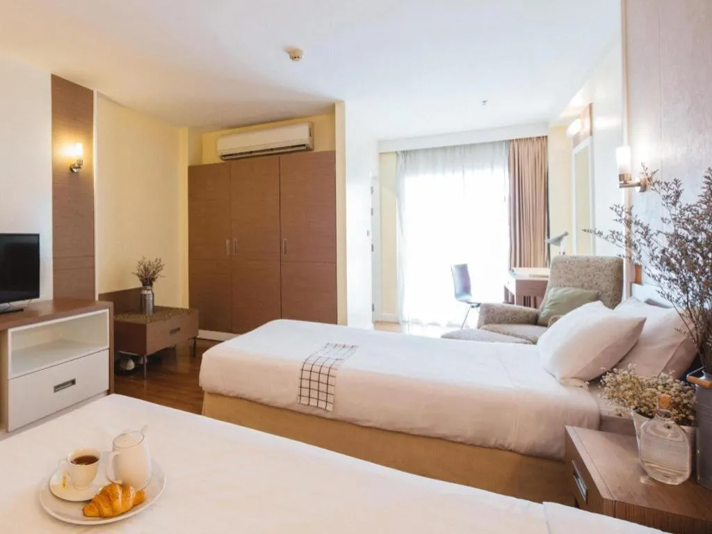 Bed in Clef Hotel Bangkok