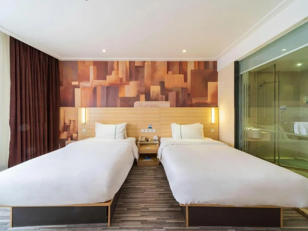 Bed in City Comfort Inn Zhongshan Lihe Square Walmart Branch