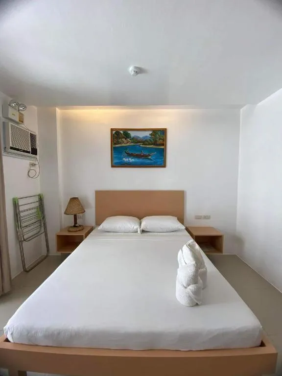 Bed in Jeffrey S Hotel