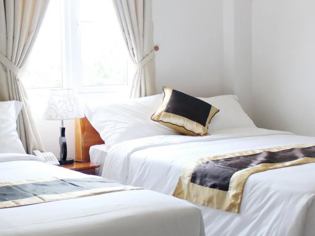 Bed in Hong Mai Hotel Nha Trang