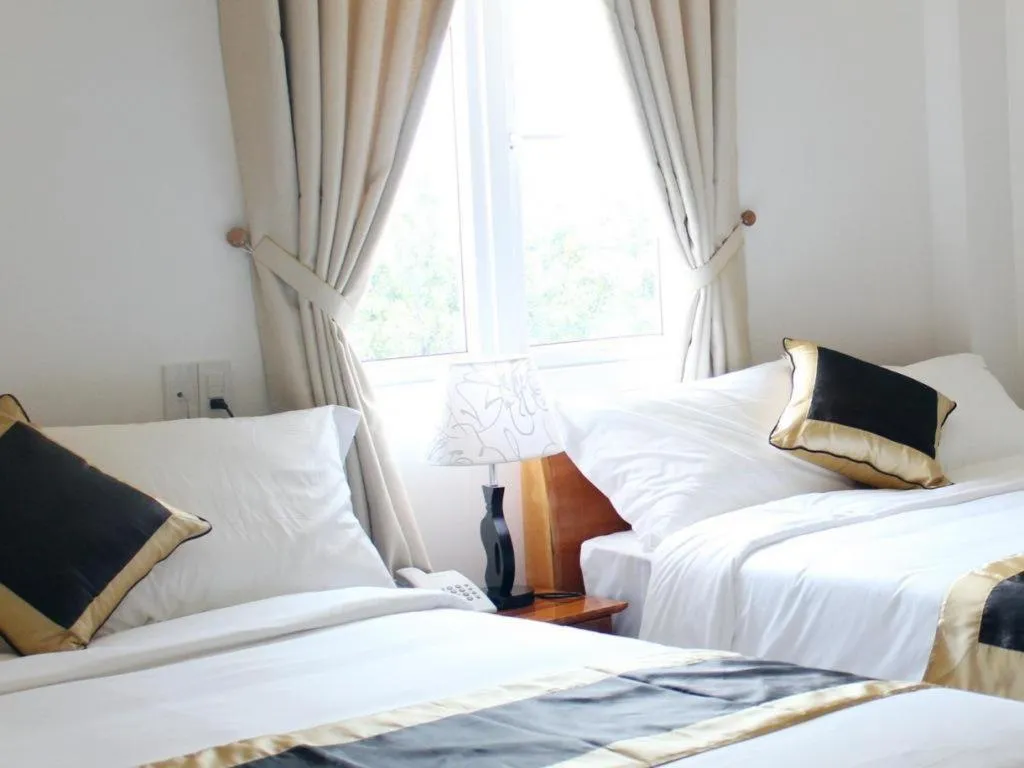 Bed in Hong Mai Hotel Nha Trang
