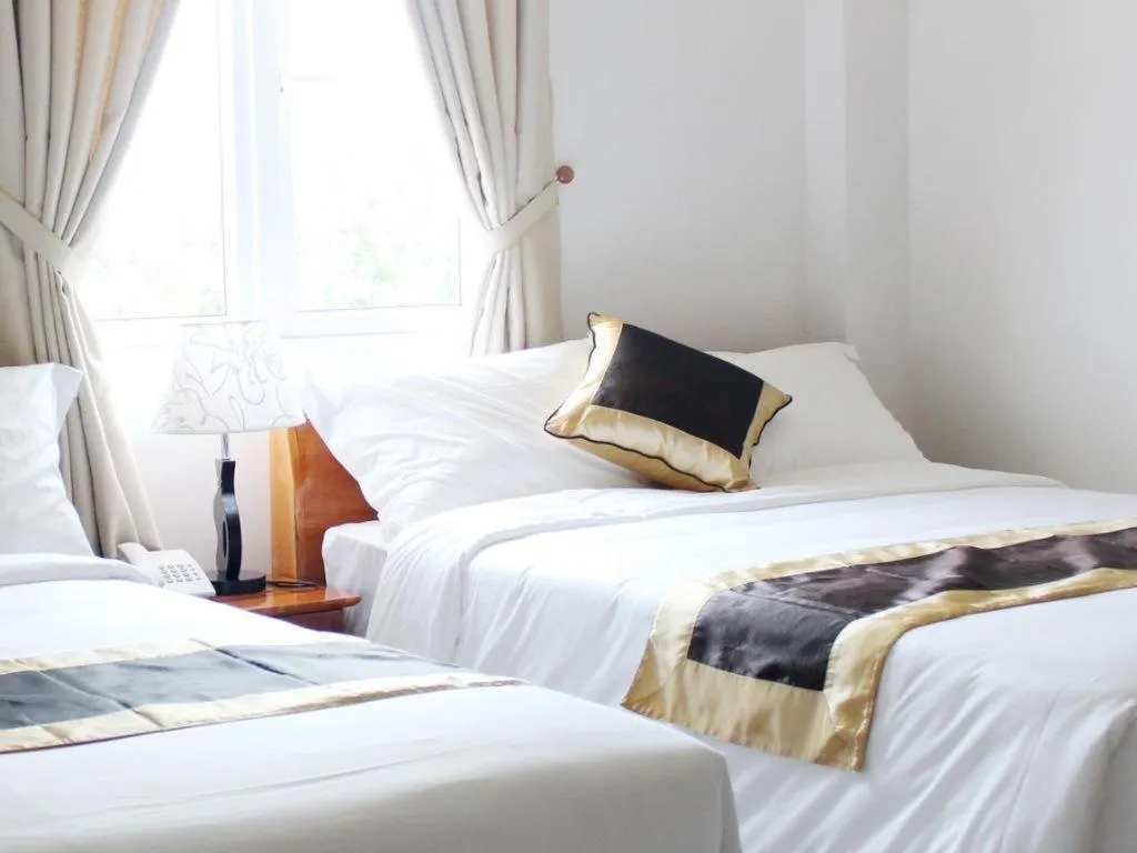 Bed in Hong Mai Hotel Nha Trang