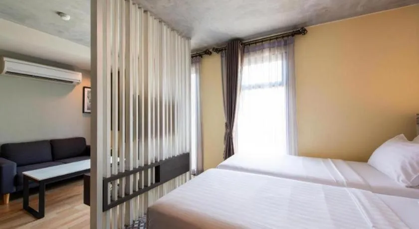 Bed in BB House Mini Suite Hotel