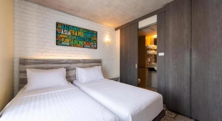 Bed in BB House Mini Suite Hotel