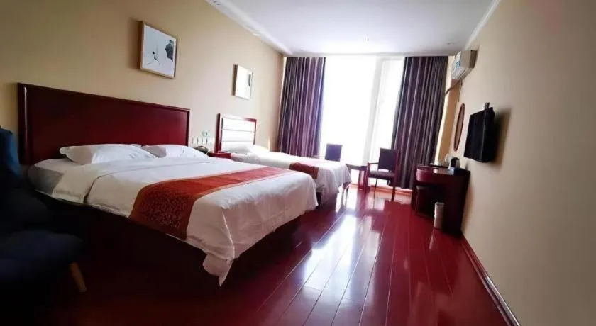 Bed in GreenTree Inn Shandong Yuncheng Ximen Street Songjiang Kung Fu School Business Hotel