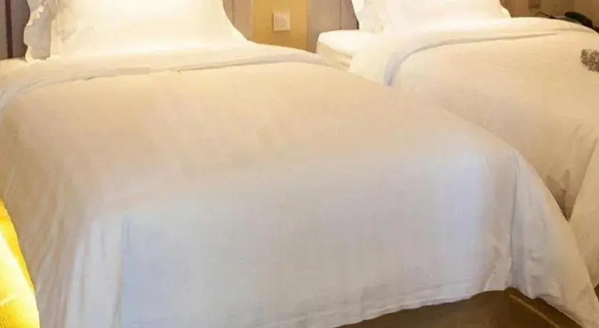 Bed in Lavande Hotel Yantai Train Station Branch Bed in Lavande Hotel Yantai Train Station Branch