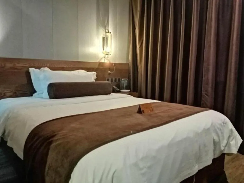 Bed in James Joyce Coffetel Wuxi Taihu Square Subway Station Branch