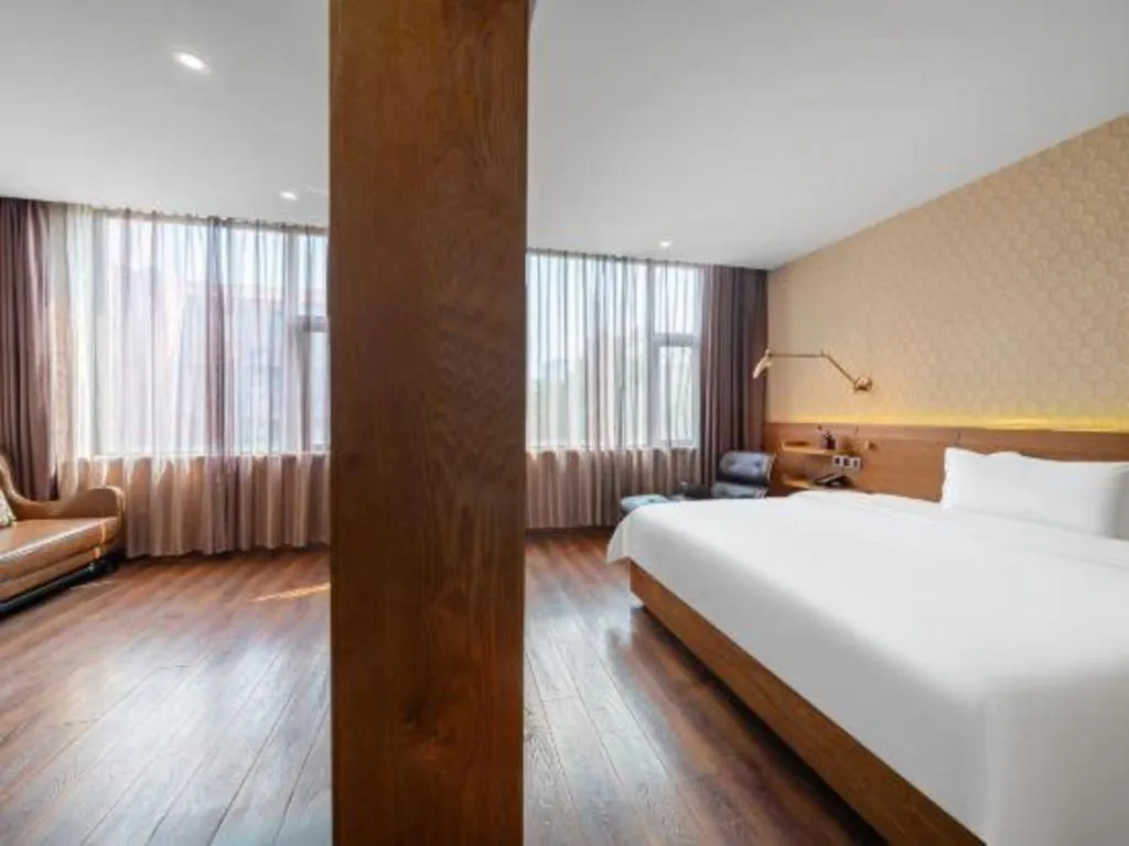 Bed in James Joyce Coffetel Wuxi Taihu Square Subway Station Branch