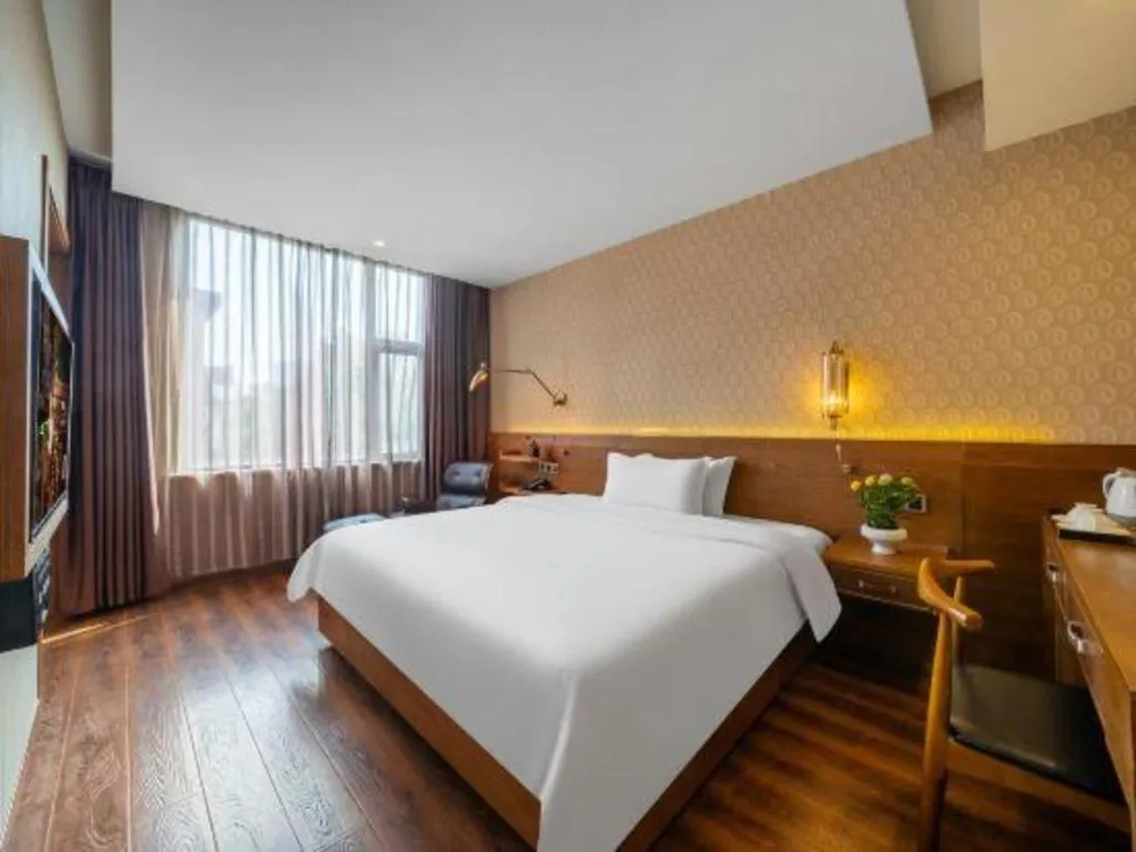 Bed in James Joyce Coffetel Wuxi Taihu Square Subway Station Branch