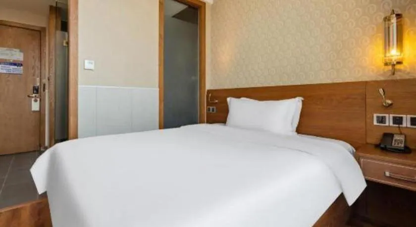 Bed in James Joyce Coffetel Wuxi Taihu Square Subway Station Branch