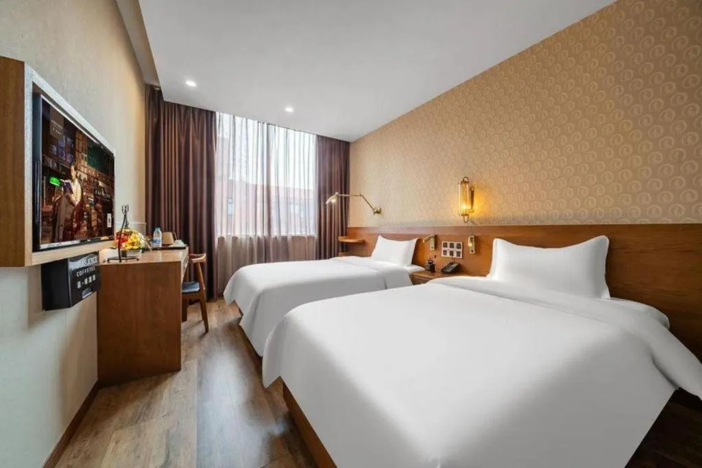 Bed in James Joyce Coffetel Wuxi Taihu Square Subway Station Branch