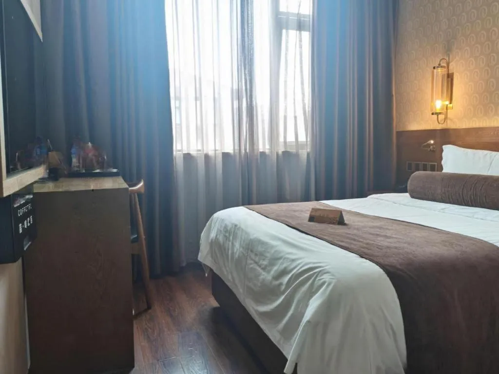 Bed in James Joyce Coffetel Wuxi Taihu Square Subway Station Branch