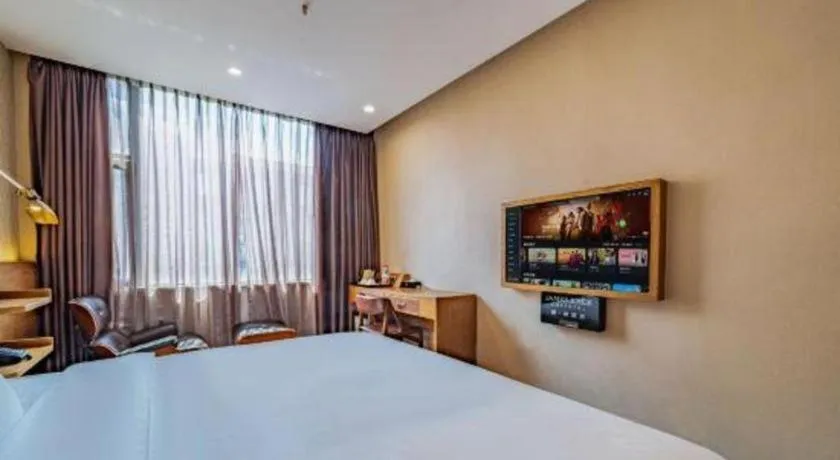 Bed in James Joyce Coffetel Wuxi Taihu Square Subway Station Branch