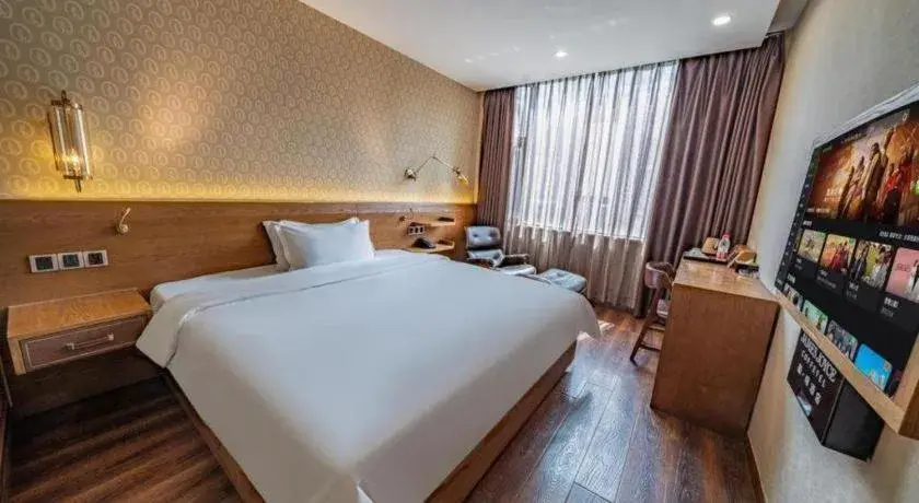 Bed in James Joyce Coffetel Wuxi Taihu Square Subway Station Branch Bed in James Joyce Coffetel Wuxi Taihu Square Subway Station Branch