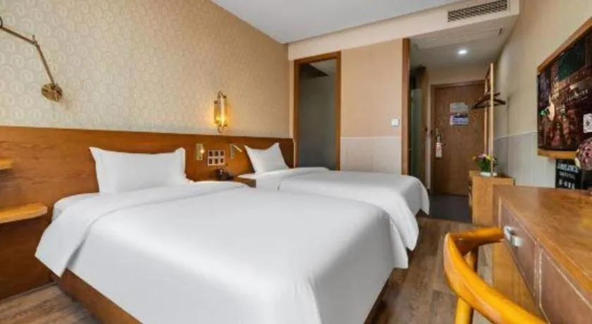 Bed in James Joyce Coffetel Wuxi Taihu Square Subway Station Branch