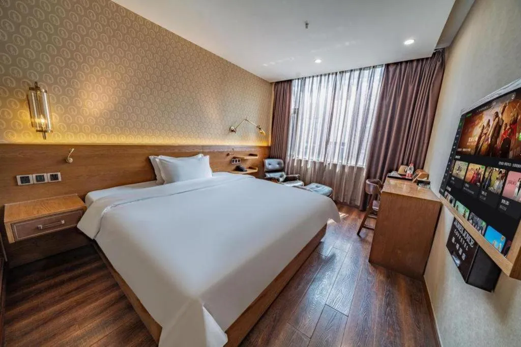 Bed in James Joyce Coffetel Wuxi Taihu Square Subway Station Branch