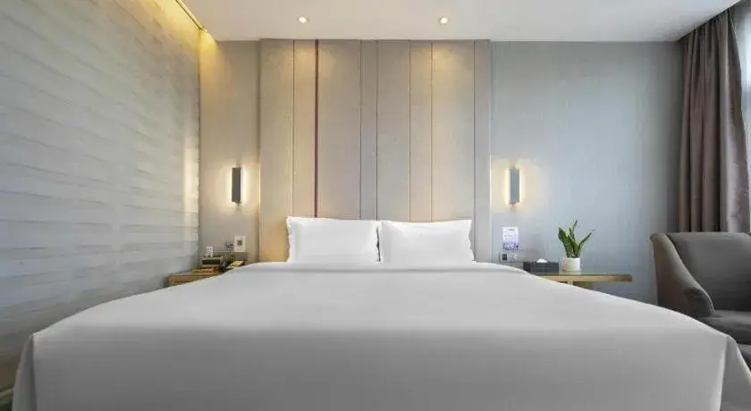 Bed in Lavande Hotel Yichang Railway East Station Branch Bed in Lavande Hotel Yichang Railway East Station Branch