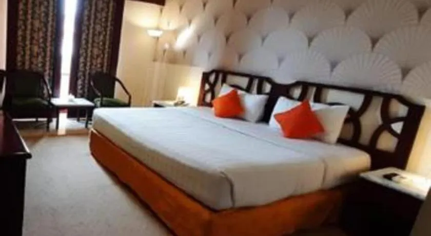 Bed in Grand Hotel Surabaya