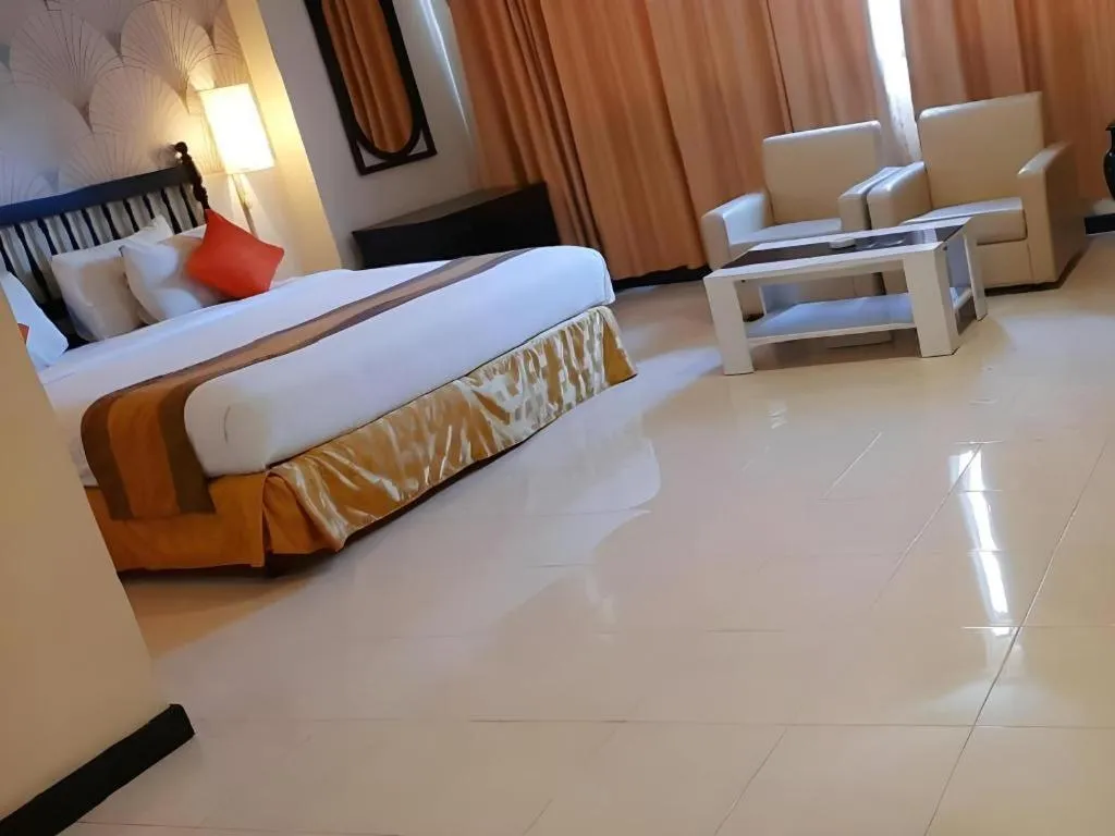 Bed in Grand Hotel Surabaya