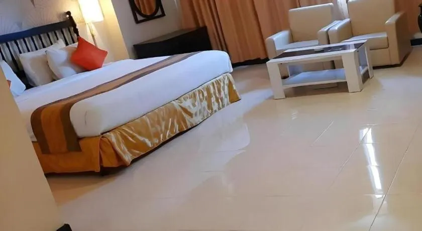 Bed in Grand Hotel Surabaya