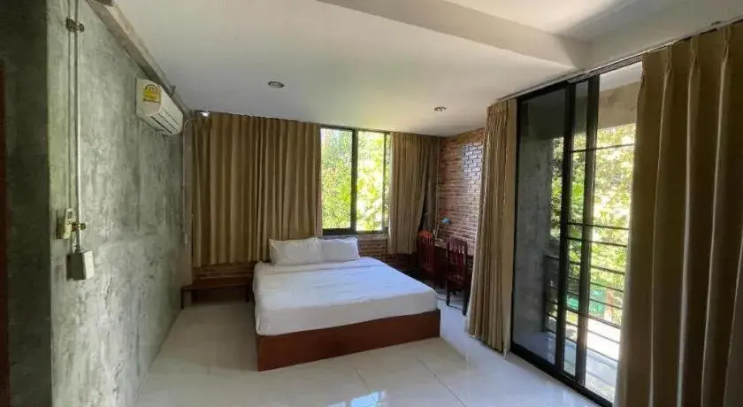 Bed in palmhouse Bed in palmhouse