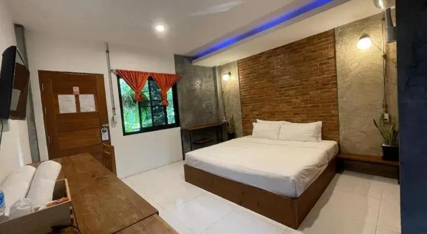 Bed in palmhouse Bed in palmhouse