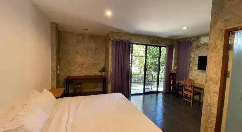 Bed in palmhouse Bed in palmhouse