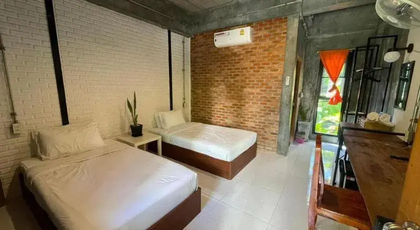 Bed in palmhouse Bed in palmhouse