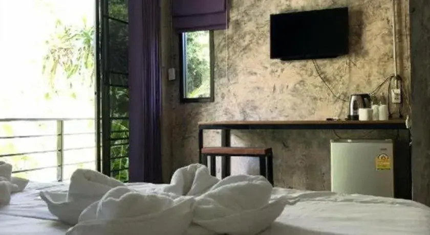 Bed in palmhouse Bed in palmhouse