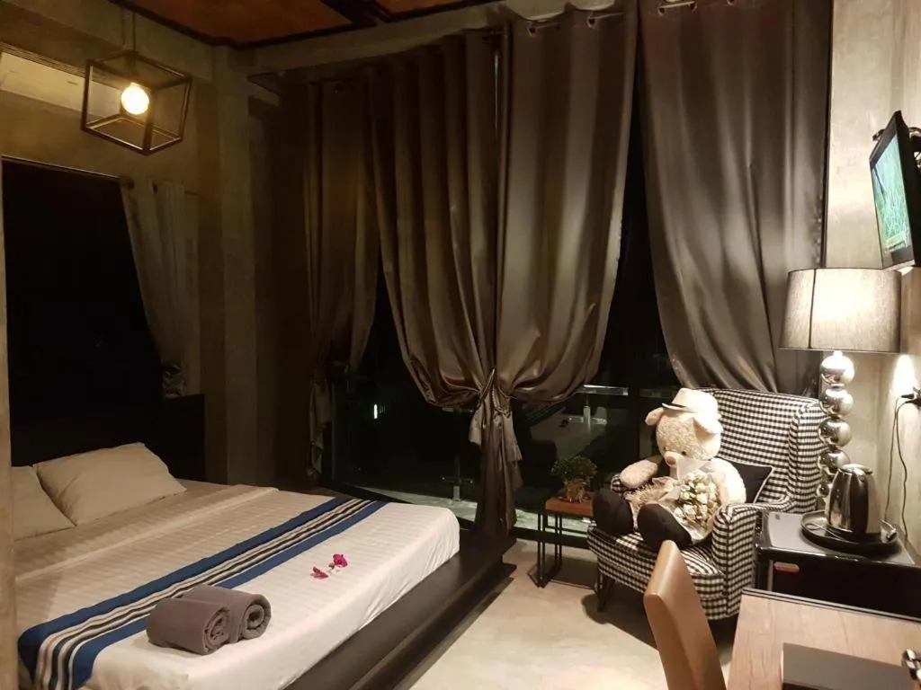 Bed in Theloft boutique nakhonpanom