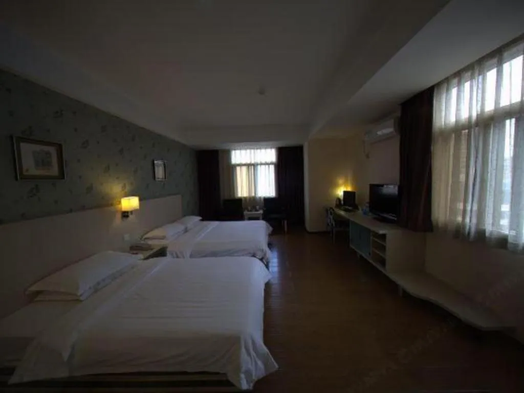 Bed in Pankun Business Hotel