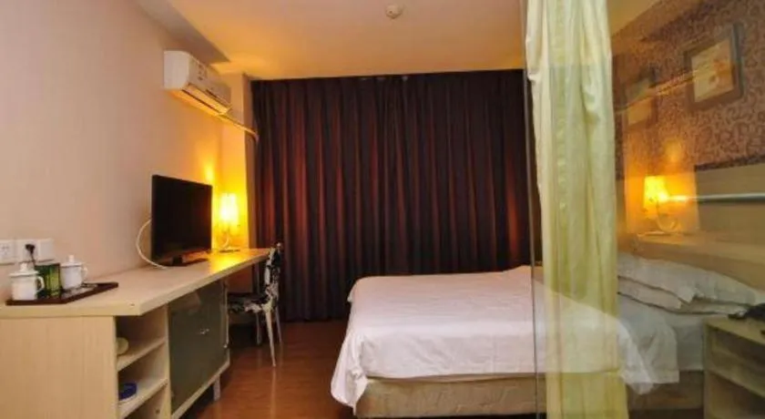 Bed in Pankun Business Hotel