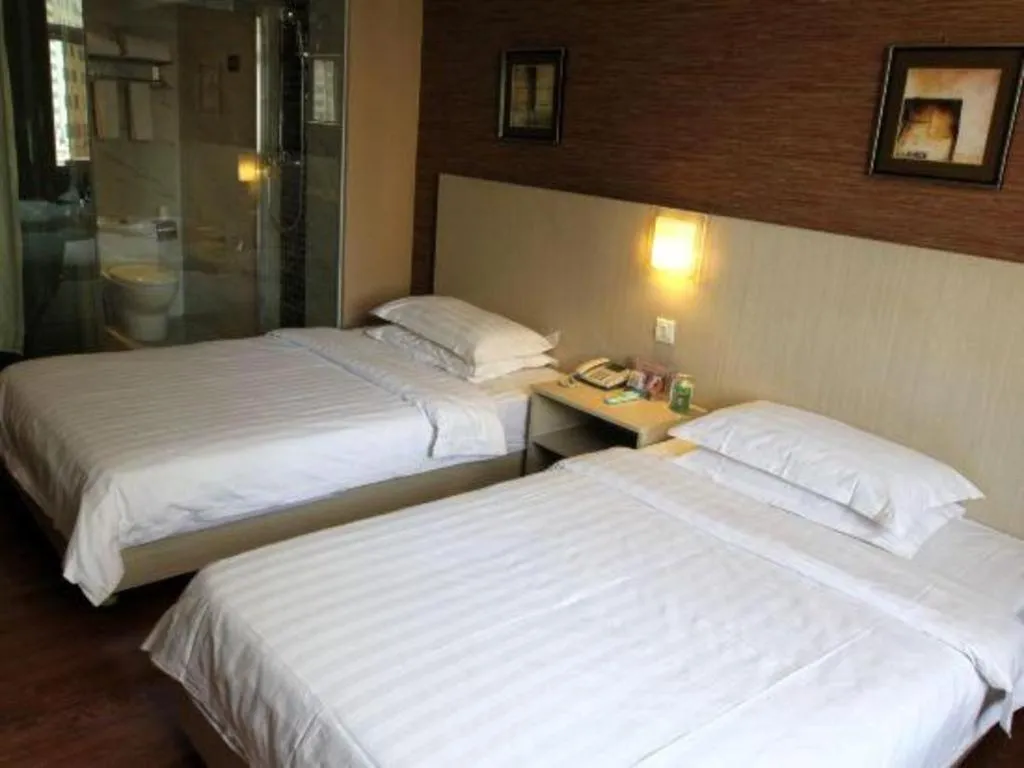 Bed in Pankun Business Hotel