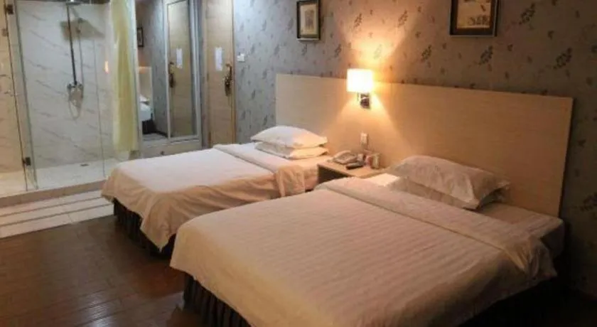 Bed in Pankun Business Hotel